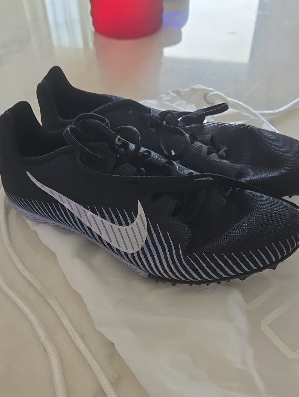 Nike Women’s Black Sneakers with White Swoosh